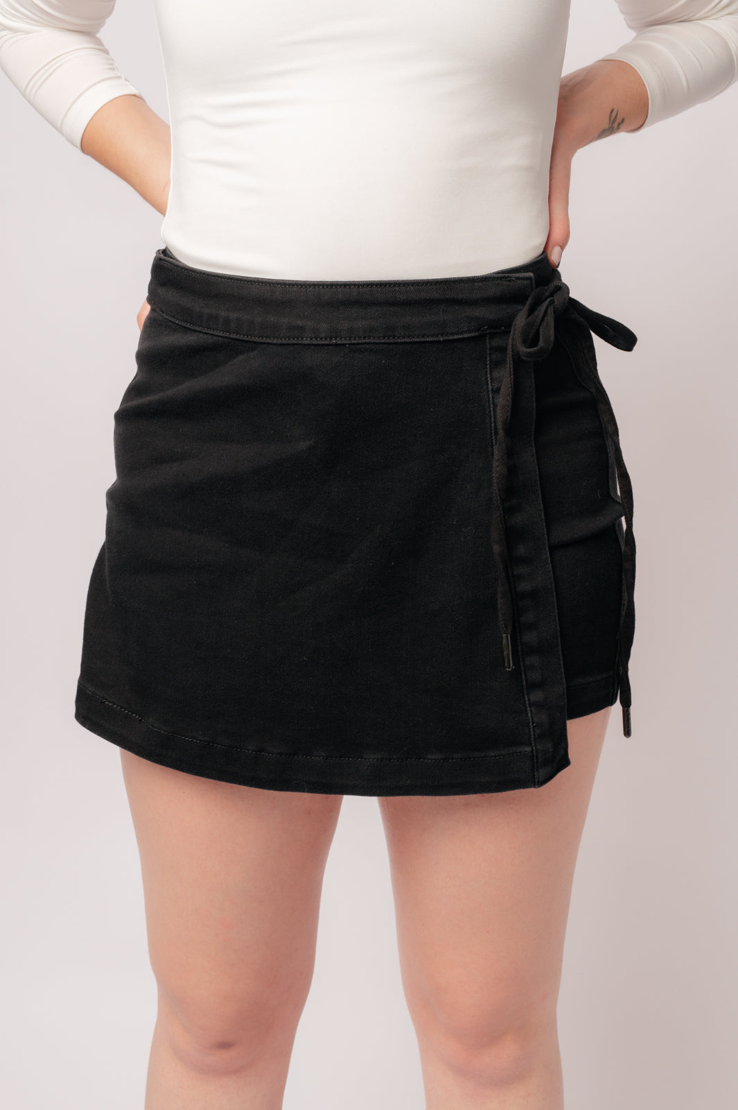 Bentley High Rise Side Tie Denim Skort in Black